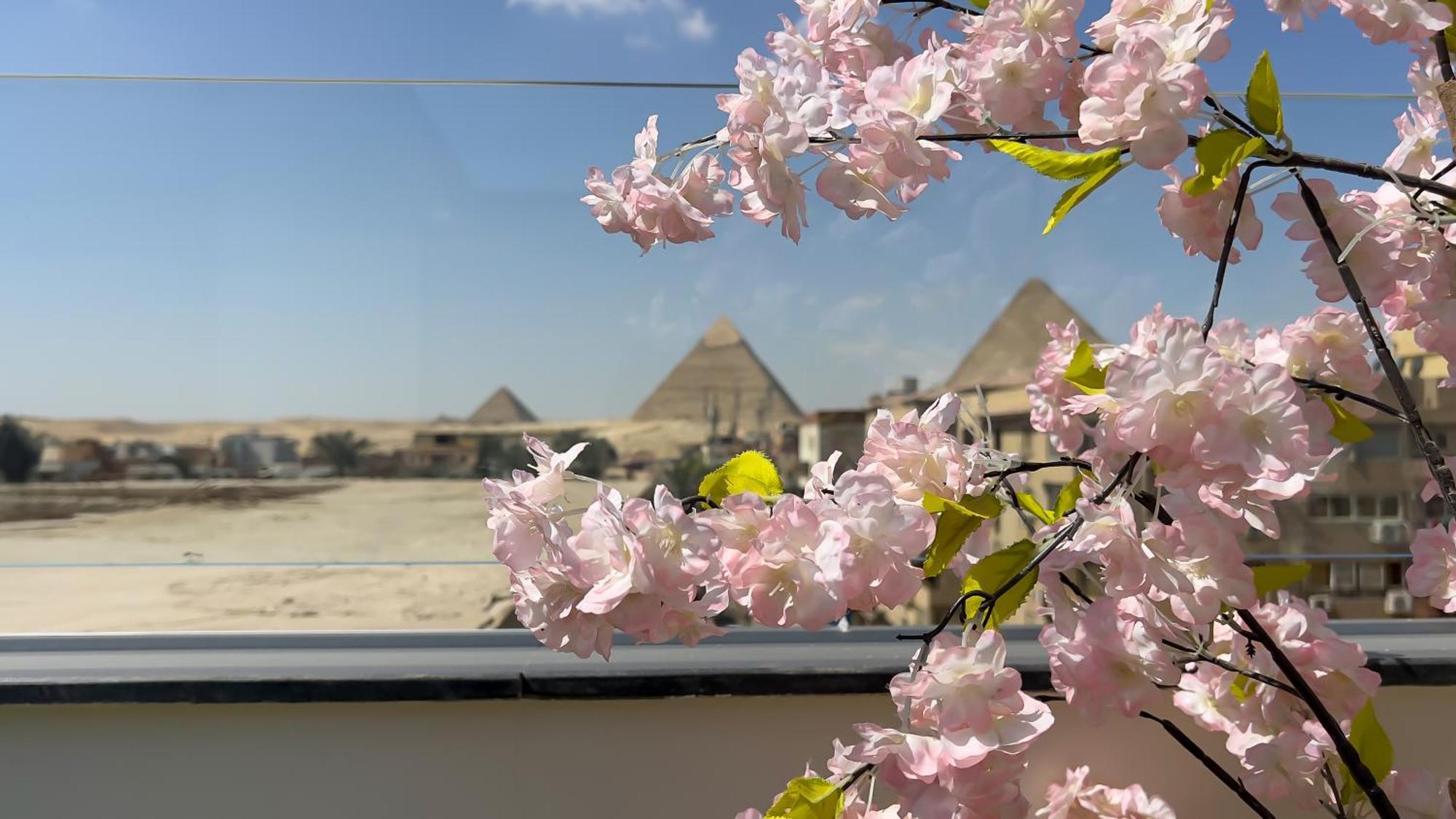 Rizk Pyramids View Hotel Kafrat al Jabal Bagian luar foto